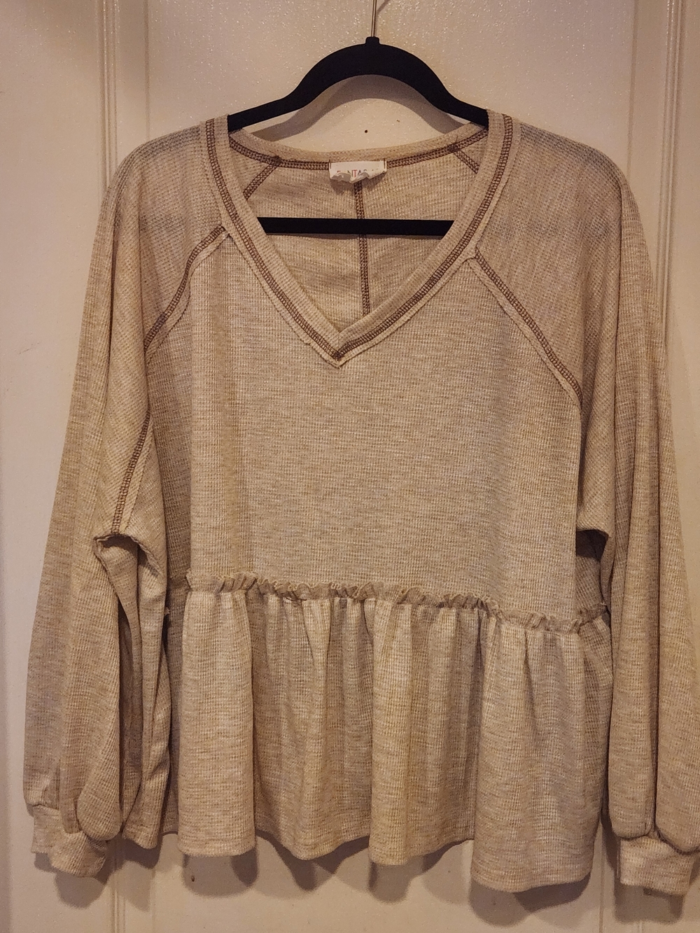 Fantastic Fawn Cream Waffle Peplum V-Neck Top